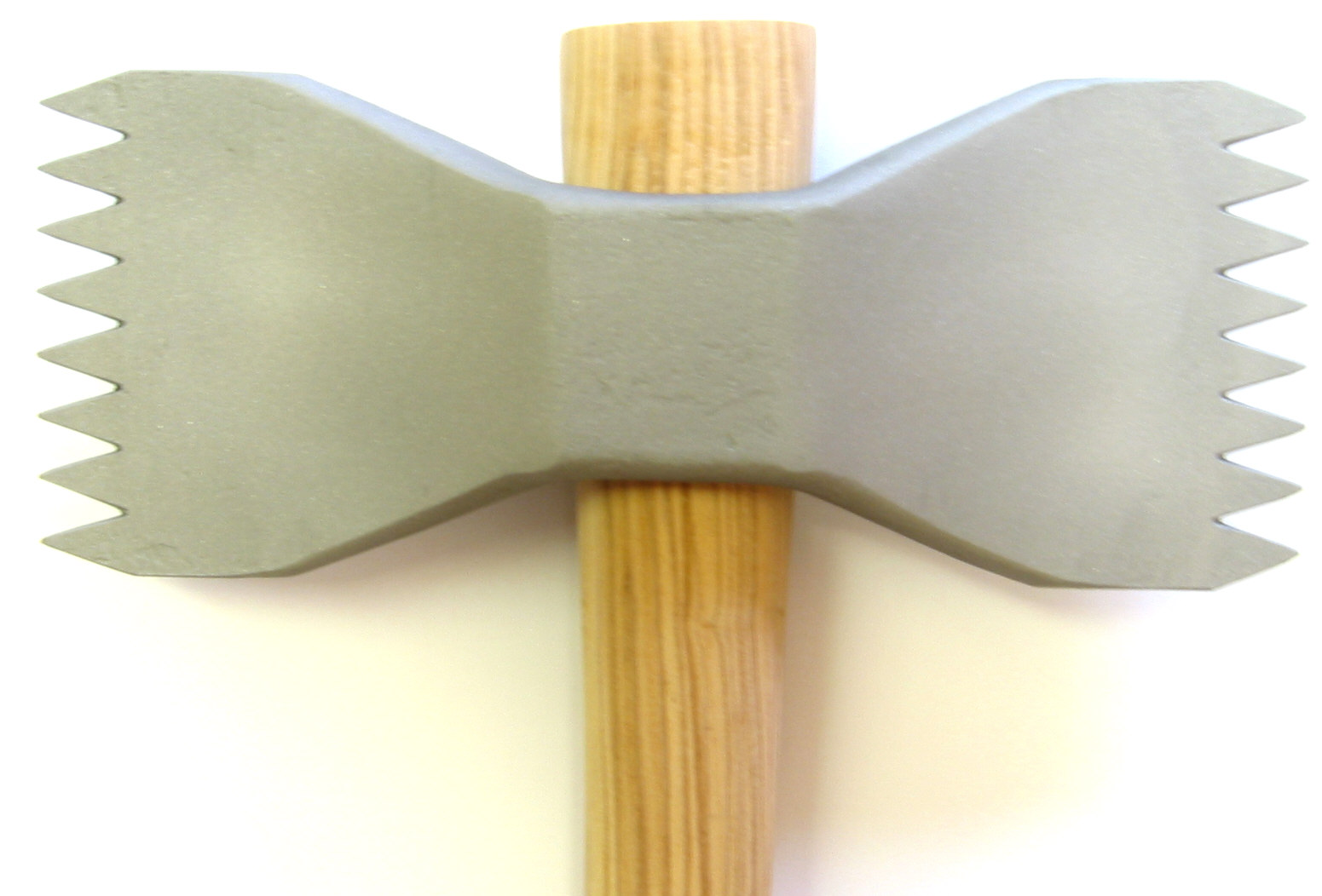 Zahnfläche beidseitig gezahnt